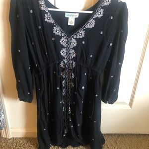 Intricate black cinch waist dress